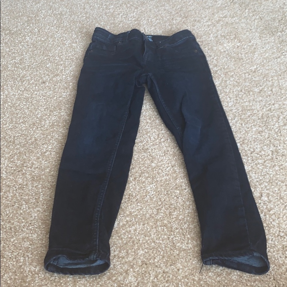 Girl’s dark wash jeans.